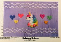 the unicorn is sitting in the middle of hearts and rainbows on it's back