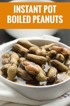 instant pot boiled peanuts in a white bowl with text overlay that reads instant pot boiled peanuts