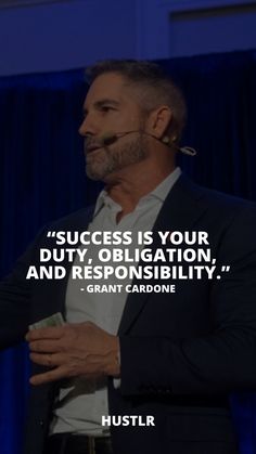 a man standing in front of a blue curtain with a quote on it that says success is