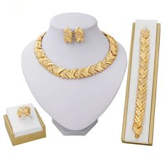 This dainty gold jewelry set will surely add sparkle to your girls on your special day! This set is perfect for the bride, bridesmaids jewelry gift, prom, or any special occasion! This Jewelry set would add more charms to your beautiful jewelry collection and would surely bring lots of compliments. It falls beautifully on the neckline giving you an elegant look. This set will definitely be a treasured inclusion in every woman's jewelry collection. Perfect As A Party Wear, Festive Wear, And Costu Dubai Gold Jewelry, Gold Jewelry Set, Pinterest Jewelry, Women Products, Dainty Gold Jewelry, Women Costume, Gold Jewelry Sets, Bridesmaid Gifts Jewelry, Gold Wedding Jewelry