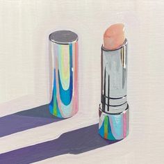 a painting of two lipsticks on a white surface