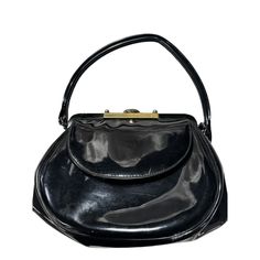 Vintage 1950s Black Patent Leather Box Handbag Purse This vintage handbag would be perfect for the rockabilly chick that wants to stand out. *Measures 8" long x 3" wide x 6 1/2" tall (from bottom to clasp) *There is a 5" strap drop This comes from a smoke free home. Vintage Black Patent Leather Handbags, Vintage Black Bag For Vintage Events, Black Vintage Bags For Vintage Events, Retro Rectangular Evening Bag For Vintage Fashion, Retro Rectangular Evening Bag For Formal Occasions, Vintage Rectangular Box Bag For Party, Retro Black Evening Bag, Classic Rectangular Evening Bag For Vintage Events, Vintage Rectangular Evening Bag