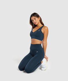 ADD A LITTLE EXTRA These collections take your staples and give you something a little bit extra. • Lightweight seamless material, great for running, cycling, light exercise, or just relaxing on your days off. Just don't do any squats in it (IYKYK).• Removable cups• Just LOOK at the low scoop back design Note: The Everyday collection isn't designed for heavy lifting or high-intensity training. To make it comfy af, the collection's made with a lightweight seamless material that can become sheer when it’s stretched. SIZE & FIT• Low support• Body fit• Model is 5’8” and wears a size XS MATERIALS & CARE• 86% Nylon, 14% Elastane SKU: B8A4T-UB9P Light Exercise, Seamless Sports Bra, Heavy Lifting, Body Building Women, Spring Tops, Back Design, Body Fit, Running Women, Black Leggings