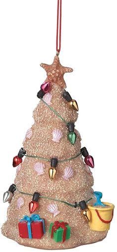 a christmas tree ornament with presents on it