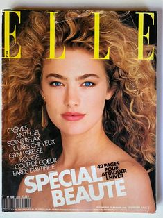 a woman with long blonde hair is featured on the cover of an issue of magazine