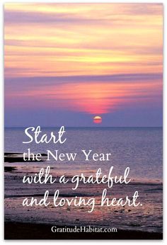 a sunset with the words start the new year with a grateful and loving heart