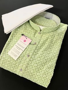 Parrot Green Chikankari Work Men's Kurta Pajama Set with full Lucknowi embroidery work on the Kurta on the Front and back side of the Kurta. Kurta comes with a Soft Lining paired with white color cotton bottom/pajama.  Father-Son Kurtas - For Boys Kurta -  https://www.etsy.com/listing/1504101684/boys-parrot-green-chikankari-lucknowi?click_key=3863dfba142cd3bf281791847f638a4782d4cc24%3A1504101684&click_sum=f5e135de&ref=shop_home_active_1&frs=1&sts=1 Kurta is Fully Lined. Very trendy and Classy Lo Parrot Green Kurta For Men, Light Green Kurta For Men, Lukhnowi Kurta For Men, Lucknowi Embroidery, Men's Kurta Pajama, Mens Ethnic Wear, Chikankari Work, Men Kurta, Men's Kurta