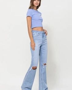 Crafted from non-stretch denim, these jeans capture the essence of the era with distressed detailing and a super high-waisted fit. The relaxed legs and wide flare design evoke a sense of nostalgia, while the authentic rigid jeans texture adds to their vintage appeal. Front Rise: 11 1/2", Inseam: 32", Leg Opening: 18"Model is 5' 9'' wearing size 26 Style: Casual Print / Pattern: Plain Silhouette: Vintage Flare Fit: Regular Embellishment: Distressed detail Neck Line: NA Sleeve: NA Length: Up to 44 Jeans Texture, Vintage Flare, Relaxed Fit Jeans, Print Pattern, Medium Blue, Fit Jeans, Jeans Fit, Stretch Denim, Style Casual