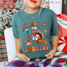 Always Be Tankful RT Nurse Thanksgiving, Turkey Thanksgiving Nurse, Thankful Greatful Shirt, Nurse Life, Nursing Fall, Comfort Colors® Shirt 👉Product * 6.1 oz./yd² (US), 10 oz/L yd (CA), 100% ring spun cotton, 30 singles. * Garment dyed for that lived in feel and almost no shrinkage at home. * Soft ring spun cotton fabric with 100% cotton threads. * Relaxed fit. * Topstitched, classic width, rib collar. * Shoulder to shoulder twill tape. * Signature twill label. * Made With Respect Proud member of the U.S. Cotton Trust Protocol. * Made with OEKO-TEX certified low-impact dyes. * Our clean pigment dye colors are salt free. 👉How To Order 1-) Please, check and review all photos 2-) Choose your t-shirt size and color *Different styles of shirts may have different shades of same color choice d Thanksgiving Shirts Nurse, Salt Free, Turkey Thanksgiving, Comfort Colors Shirt, 30 And Single, Nurse Life, Thanksgiving Turkey, Cotton Thread, Twill Tape