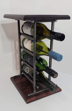 a wine rack with several bottles in it