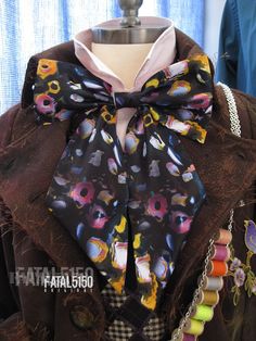 a mannequin wearing a colorful bow tie