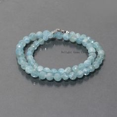 PRODUCT DETAIL :ITEM : AQUAMARINE BEADED NECKLACEITEM CODE :  DGC3081ITEM NAME :NECKLACEGEMSTONE :   AQUAMARINEBEADS SHAPE : FACETED ROUNDLENGTH :   17 INCH APPROXBEADS SIZE:  6mm-8.5 mm ApproxWEIGHT :  154 Cts. APPROXCUSTOMIZATION/BULK ORDER : AVAILABLEPLEASE FEEL FREE TO CONTACT IF YOU REQUIRE ANY FURTHER INFORMATION. Aquamarine Gemstone Round Bead Necklaces, Aquamarine Gemstone Necklaces With Round Beads, Aquamarine Gemstone Beaded Necklace, Blue Faceted Round Bead Crystal Necklace, Blue Faceted Crystal Necklace With Round Beads, Blue Faceted Round Bead Necklaces, Blue Faceted Necklaces With Round Beads, Blue Necklaces With Faceted Round Beads, Blue Crystal Necklaces With Gemstone Round Beads