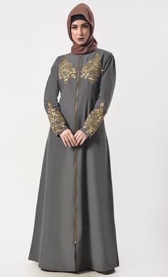 PRODUCT DETAILS This is a premium fabric, with a rich feel & texture and is flowy, opaque and with a great fall. Be each day Classic with beautiful our applique work detailing abaya. It has a round neck with zipper down style for easy closure, long sleeves with embroidered for enhancing the look and pockets for your better utility. Size & Fit The model (height 5'8") is wearing a size S Material & Care Material: kashibo Eazy Wash Specifications Sleeve Length Long Sleeves Length Full length Type A Zipper Abaya, Abaya With Pockets, Applique Work, Classic Grey, Great Falls, Designer Dress, Embroidery Fashion, Hijab Tutorial, Luxury Style