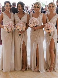 the bridesmaids are all wearing different dresses