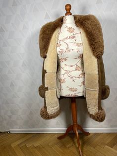 Brown Long Fur Coat For Winter, Sheepskin Fur Coat In Beige For Cold Weather, Fluffy Brown Fur Coat For Cold Weather, Bohemian Brown Outerwear With Faux Fur Lining, Bohemian Long Fur Coat With Faux Fur Trim, Bohemian Faux Fur Coat For Winter, Bohemian Long Sleeve Fur Coat With Faux Fur Lining, Penny Lane Coat 70s, Hooded Brown Sheepskin Fur Coat