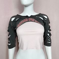 reworked distressed grunge cut up crop sleeve shrug with cut "high fives" front graphic & large Radio Records 1982 retro graphic on back. soft stretchy lightweight knit cotton blend fabric. marked kids size 8, fits size women's small *does not come with tank shown in pic ♡ a one of a kind reworked / upcycled piece by strawbana ♡ * stretch: yes * material: cotton blend (no tag) * color: gray red tan white marked size: youth 8 *see measurements for best fit ❀ condition: preowned - excellent. purposefully distress / tears throughout ❀ approx measurements: pit to pit: 16.5-19" length: 6-12" ❀ shown on: chest: 32" waist: 24" ❀ please dm if questions