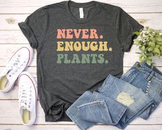 Never Enough Plants Shirt - Unisex T Shirt, Women Racerback Tank, Long Sleeve T-Shirt Tees Tshirt Sweatshirt Sweater Hoodie Gift For Men Women Boys Girls Well, let's say goodbye to all this boring apparel... The GodBlessThisDesign team creates custom clothes with great designs to suit all tastes. Our unique and blessed designs are a blast fit for every occasion and always a perfect fit... We combine our beautiful designs with high quality apparel like no one has ever done before. There's nothing worse than being charmed by a nice design and then finding that the apparel with that design looks like an old cheap and mediocre quality apparel. All right, then ... we got you covered. You are absolutely going to love our dynamic duo of comfortable AND cute apparel. A B O U T - T H I S - A P P A