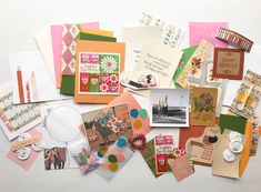 many different types of greeting cards on a table