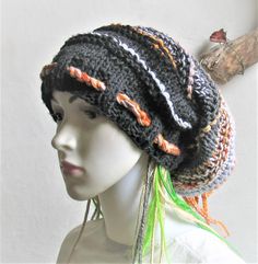 Dreads Long Tube Hat dreadlock Sock Oversized Slouchy Unisex Winter Slouchy Hat Knit Rasta Tam Hippie Boho Headband Dreadstyles Buggy Hat Dreads Woodland Hat Long slouchy beanie. In soft acrylic yarn. Vegan friendly headgear. It's warm and yet suitable to wear all year around.This hat should be suitable for long dreads.Width at brim 22", stretches to 27", cinches smaller with drawstringLength from crown to rim13"Stretches longer or wider if needed. If you need other colours or dimensions please Black Bohemian Crochet Hat, Black Bohemian Knitted Hat, Bohemian Winter Headwrap One Size, Bohemian One Size Winter Headwrap, Bohemian One-size Winter Headwrap, Adjustable Black Winter Headwrap, Casual Black Festival Headwrap, Casual Black Crochet Hat For Festival, Adjustable Bohemian Winter Headwrap