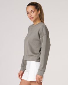 The scuba crewneck sweatshirt is designed with a relaxed fit and dropped shoulders, perfect for any casual activity. It is ideal for dressing down or layering up, whether paired with shorts or joggers. Features subtle embroidered logo and pleat on the back for an elevated piece. Layer this sweatshirt over a blouse and pair it with our pintuck wide leg pant for a professional look. Made from our luxurious scuba fabric, it is has a medium weight coverage and a drapey feel that is cooling and smoot Scuba Sweatshirt, Desert Sage, Scuba Fabric, Wide Leg Pant, Professional Look, Active Women, Dressed Down, Wide Leg Pants, Crewneck Sweatshirt