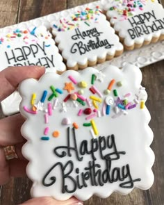 happy birthday decorated cookies with sprinkles and confetti for someone's special occasion