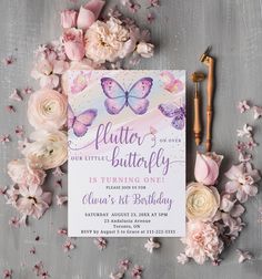 a birthday party with pink flowers and butterflies