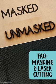 a sign that says mask unmasked on the side of a metal surface with black lettering