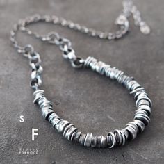 Necklace is made of oxidized silver 925 The details diameter is up to 0.31" (8 mm) Measurements: The whole length (optional): 15 - 24 inches  1.57 " extender (38-61cm 4 cm extender) The necklace worn by the model is 18" (45,5cm) long, Its weight is 14,5g. There's also an option to buy a bracelet and earrings to the set (visible on the last photograph). The elements in the necklace are strung on the professional, flexible stainless wire  It's signed © formood Artur Hornowski.  Thank you for visit Silver Sterling Chain Necklace With Oxidized Finish, Hand Forged Silver Metal Chain Necklace, Sterling Silver Brutalist Necklace For Gift, Silver Sterling Silver Brutalist Necklace, Hand Forged Sterling Silver Jewelry In Gunmetal, Modern Silver Necklace With Oxidized Finish, Everyday Sterling Silver Necklace With Oxidized Finish, Hand Forged Gunmetal Sterling Silver Jewelry, Silver Brutalist Jewelry With Oxidized Finish