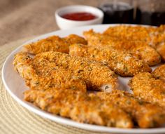 fried food on a plate with dipping sauce