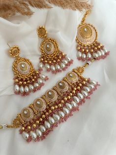 Gold tone pearl choker  comes with earrings and tikka Earring length - 3 inches Choker width- 3 inch Style tip- ----------- Pair it with any beautiful traditional outfits  and flaunt with Unique style of collection from us. Perfect match for Festival and Traditional wear.  Take Care Tips-  ---------------- Kee away from perfume, Hair spray and. Moisture.  Store in dry place , Ziplock bag or Airtight box.    Clean with dry cloth.  Jewellery is the last thing you should wear and first thing you sh Cloth Jewellery, Antique Gold Jewellery, Punjabi Jewelry, Kundan Choker Set, Fancy Jewelry Necklace, Kundan Jewelry, Kundan Choker, Antique Jewelry Indian, Ziplock Bag