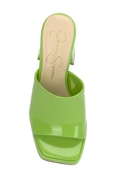 A subtle platform and chunky block heel elevate a retro-inspired slide sandal that will complement your trendsetting looks. 3 1/2" heel; 3/4" platform Elastic gore inset Leather upper/synthetic lining and sole Imported Summer Synthetic Mules With 4-inch Heel, Green Platform Sandals With Block Heel, Green Synthetic Sandals With 4-inch Heel, Green Open Toe Block Heels With Stacked Heel, Modern Synthetic Sandals With 4-inch Heel, Trendy Green Block Heel Mules, Modern Slides With Sculpted Heel For Spring, Modern Platform Slide Heels, Synthetic Platform Slide Heels