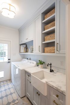 a white washer and dryer in a room