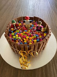 there is a cake made to look like it has many candies in the middle