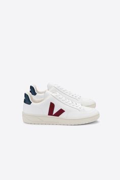 Veja V-12 Extra White/Marsala/Nautico Veja is a cult French footwear label with a strong focus on transparency, fair trade and social and environmentally responsible practices. It works closely with Brazilian producers to craft luxurious sneakers using sustainable materials including organic cotton, vegetable-dyed leather and wild rubber from the Amazon rainforest. Veja is a certified B Corporation.  The V-12 model is made out of ecological and sustainable materials.  - Upper in leather  - Panels made out of leather  - Logo V made of rubber  - Lining in jersey (33% organic cotton & 67% recycled polyester)  - Insole made out of wild rubber and other synthetic materials  - Sole made of wild rubber from the Amazonian forest (25%)  Made in Brazil, in the region of Porto Alegre. The Amazon Rainforest, Amazon Rainforest, Karen Walker, Synthetic Materials, Leather Logo, Sustainable Materials, Making Out, Fair Trade, It Works