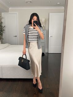 Shop Mongolian Cashmere Tee and other curated products on LTK, the easiest way to shop everything from your favorite creators. Cute Modest Summer Outfits, Tuck A Shirt, Quince Outfits, Slip Skirt Outfit, Sweater Hacks, Silk Skirt Outfit, Silk Slip Skirt, Satin Skirt Outfit, Spring Skirt Outfits