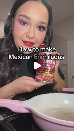 a woman holding a can of mexican enchiladas in front of a frying pan