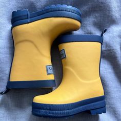 Yellow And Navy Toddler Rain Boots. New Without Tag. Size 4c Cute Waterproof Boots With Round Toe, Playful Round Toe Boots For Outdoor, Cute Outdoor Boots With Round Toe, Playful Non-slip Boots With Round Toe, Playful Waterproof Boots With Round Toe, Playful Waterproof Round Toe Boots, Casual Non-slip Boots For Playtime, Casual Non-slip Boots For School, Yellow Round Toe Rain Boots For Spring