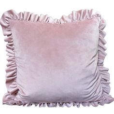 a pink velvet pillow with ruffled edges