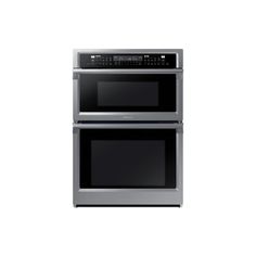 two ovens side by side on a white background, one is black and the other is silver