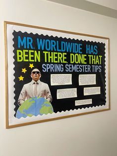 a bulletin board on the wall in an office space with information about mr world wide has been there, done that spring semester tips