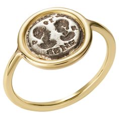 This DUBINI coin ring from the 'Empires' collection features a silver replica of a roman seal of man and woman with auspicious inscription set in 18K yellow gold. HISTORY Amor Vincit Omnia (means love conquers all) Portraits of two spouses facing one another, was often set on a bronze, or silver or gold ring and used as a seal. Rings engraved with the busts of married couples became very fashionable in the 5th and 6th Century throughout the Roman Empire. Typically the portraits are generic and n Coin Rings Women, Empire Romain, Roman Coins, Coin Ring, Couple Rings, Yellow Gold Ring, Engraved Rings, Signet Ring, Bridal Rings