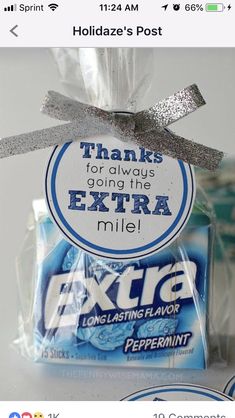 an extra chewing bar wrapped in plastic and tied with a silver ribbon on top of it