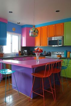 colorful kitchen with island and bar stools