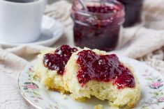 two pieces of cake on a plate with jam