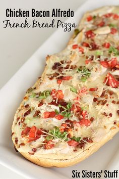 the chicken bacon alfredo french bread pizza is ready to be eaten