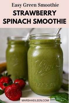 two mason jars filled with green smoothie and strawberries on the side text reads easy green smoothie strawberry spinach smoothie