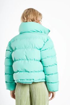 Glamorous Jade Green Padded Puffer Jacket.This puffer jacket will be your go to piece for this up and coming autumn season. With and oversized collar and drawstring features to keep the cold out, this is a stylish but practical piece. Composition: Shell: 100% Polyester, Lining 100% Polyester Model Wears Size 10. Model Height: 5'10''. Spring Streetwear Puffer Jacket With Detachable Hood, Green Quilted Puffer Jacket For Streetwear, Green Down Puffer Outerwear, Green Nylon Puffer Outerwear, Green Puffer Jacket For Outdoor, Green Down Puffer Jacket, Green Nylon Puffer Jacket With Padded Collar, Green Down Puffer Jacket For Winter, Green Down Puffer Jacket With Padded Collar