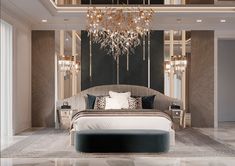 a large bed sitting in the middle of a room next to a chandelier