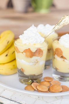 small desserts with bananas and whipped cream on a plate