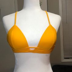 Never Worn Bright Orange/Yellow Bikini Top Yellow Strappy Swimwear For Vacation, Yellow Strappy Swimwear For Beach, Yellow Strappy Swimwear For The Beach, Yellow Strappy Swimwear For Poolside, Yellow Strappy Summer Swimwear, Yellow Strappy Swimwear For Summer, Yellow Triangle Top Swimwear With Stretch, Yellow Strappy Swimwear, Yellow Stretch Swimwear For Spring